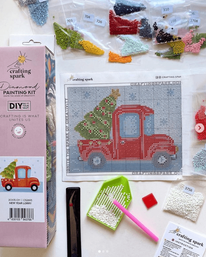 New Year Lorry CS2693 diamond painting kit with tools and pre-sorted acrylic diamonds, showcasing vibrant colors and detailed design.